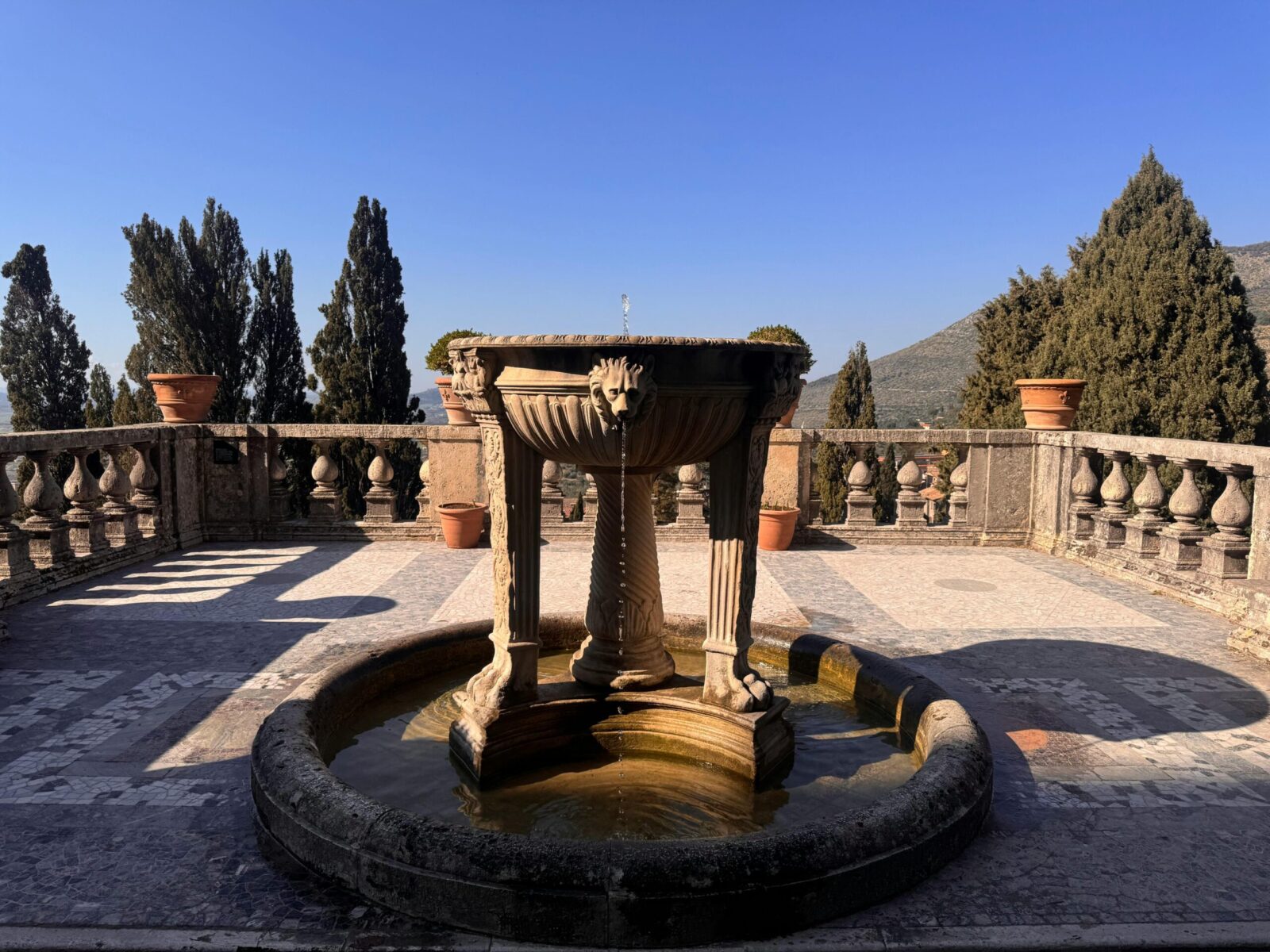 Stunning fountain at Villa D'Este, Tivoli with scenic views. Perfect for art and travel visuals.